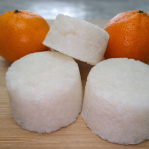 Solid orange shampoo bars